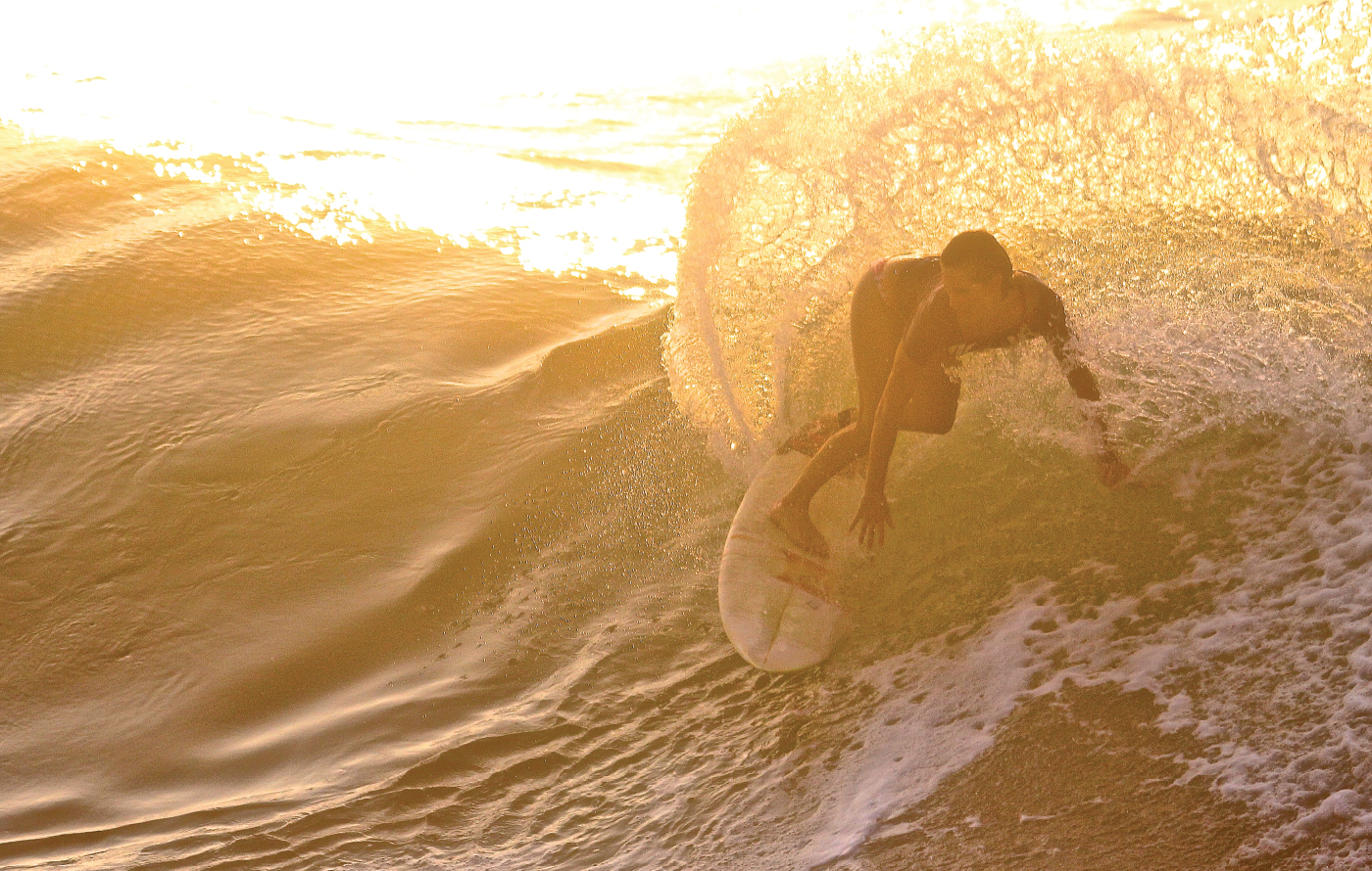 Surfing | Photo credit: Giorgio Rollo